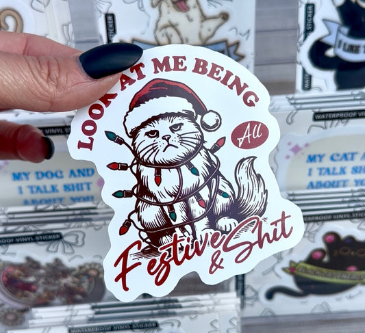 Cat being festive & sh*t